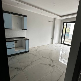 Квартира 1+1 от инвестора в центре Алании, пляж Клеопатра (13400)