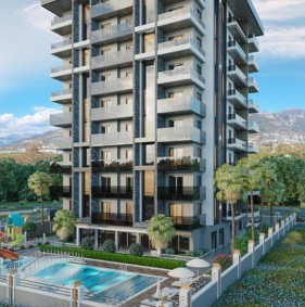 Уютные современные квартиры в жилом комплексе от застройщика в районе Махмутлар (01432)