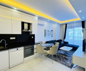 Квартира 1+1 в новом комплексе апартаментов в курортном районе Махмутлар (0320001)